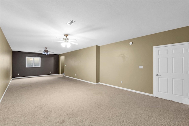 2302 Slade Ln, Mahomet, IL 61853 - empty room with carpet flooring and a ceiling fan