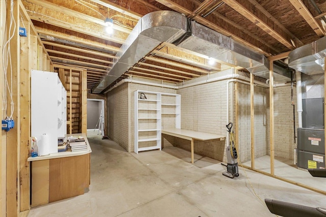 2302 Slade Ln, Mahomet, IL 61853 - unfinished below grade area with brick wall
