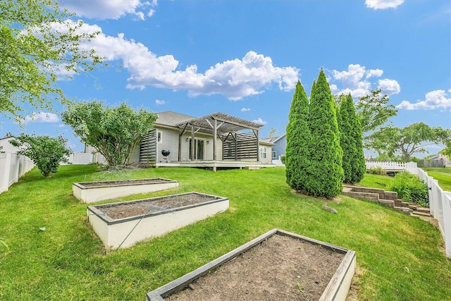 2302 Slade Ln, Mahomet, IL 61853 - rear view of property with a garden, a pergola, and a fenced backyard
