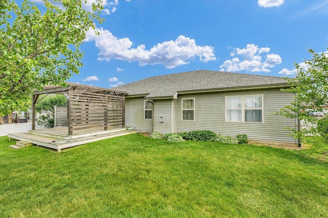 2302 Slade Ln, Mahomet, IL 61853 - back of property with a wooden deck, a pergola, a yard, and a shingled roof