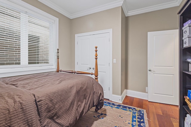 718 W Aldine Ave Unit 3, Chicago, IL 60657 - bedroom with wood finished floors, baseboards, and ornamental molding