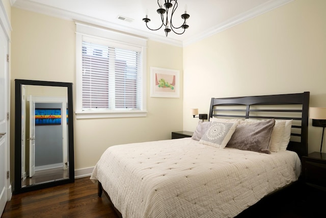 1827 N Larrabee St Unit 4, Chicago, IL 60614 - bedroom with wood finished floors, crown molding, a chandelier, and baseboards