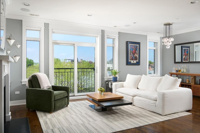 1827 N Larrabee St Unit 4, Chicago, IL 60614 - living area featuring wood finished floors, ornamental molding, a fireplace, baseboards, and recessed lighting