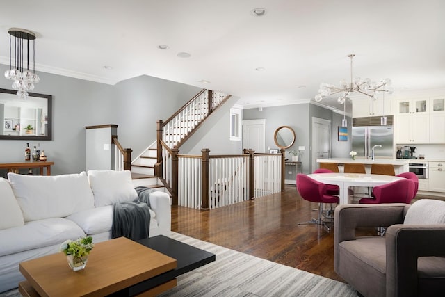 1827 N Larrabee St Unit 4, Chicago, IL 60614 - living area featuring crown molding, a chandelier, wood finished floors, stairs, and recessed lighting