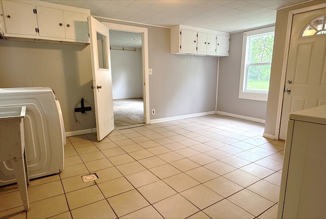 12445 W Pacific Ave, Waukegan, IL 60085 - laundry area featuring cabinet space, light tile patterned floors, and washer / dryer