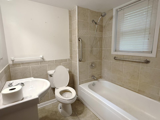 12445 W Pacific Ave, Waukegan, IL 60085 - full bathroom with tile walls, bathing tub / shower combination, and tile patterned floors