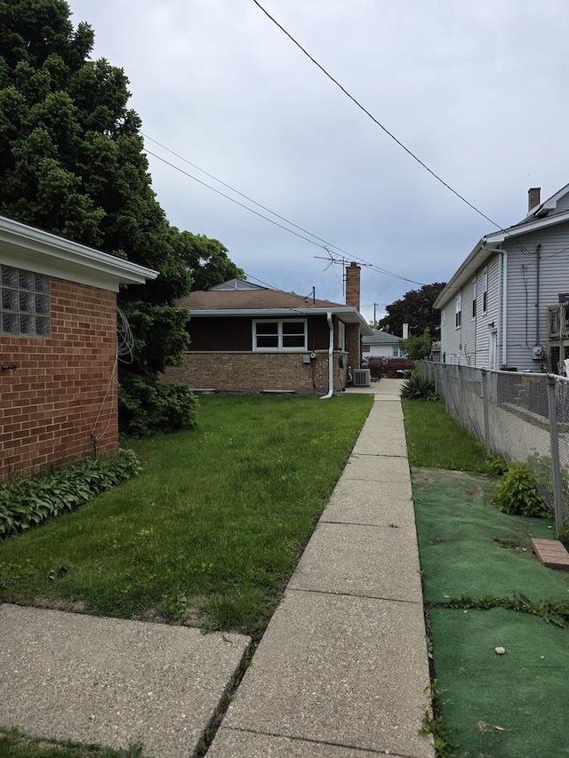 6124 W Berteau Ave, Chicago, IL 60634 - view of yard with central air condition unit