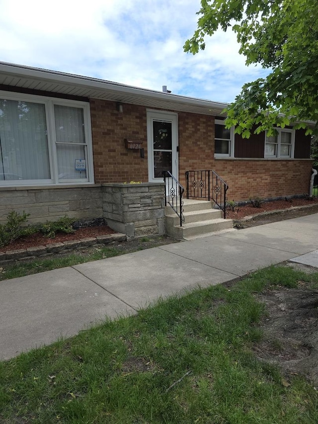 6124 W Berteau Ave, Chicago, IL 60634 - view of front of home featuring brick siding