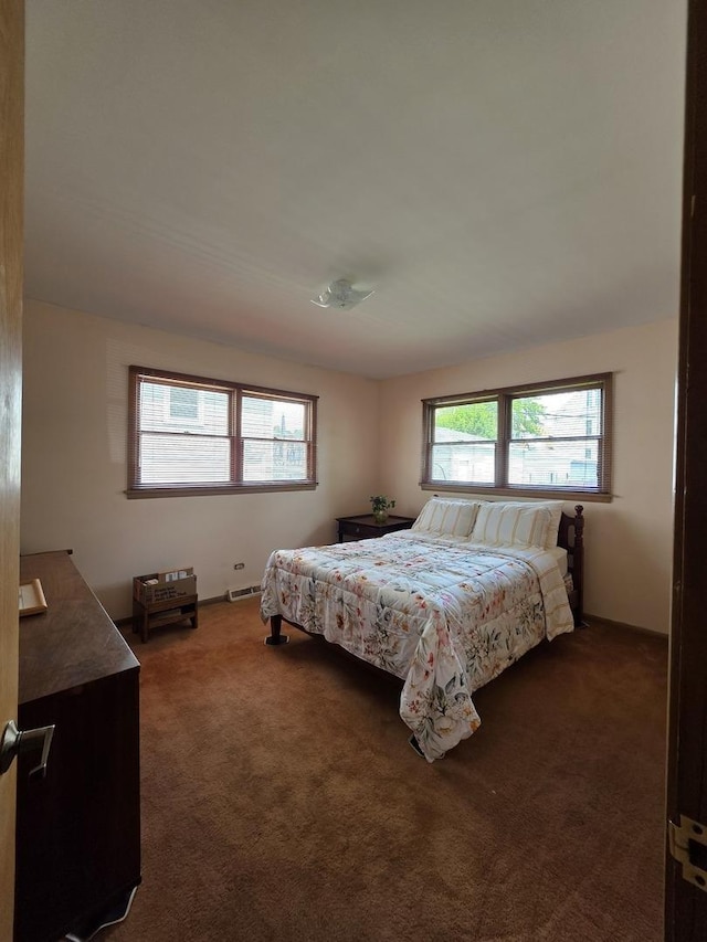 6124 W Berteau Ave, Chicago, IL 60634 - bedroom featuring dark carpet