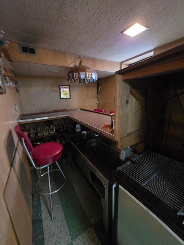 6124 W Berteau Ave, Chicago, IL 60634 - bar with tile patterned floors