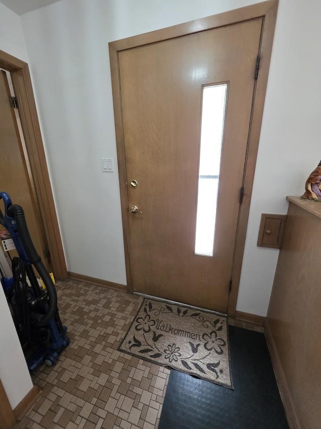 6124 W Berteau Ave, Chicago, IL 60634 - foyer featuring baseboards