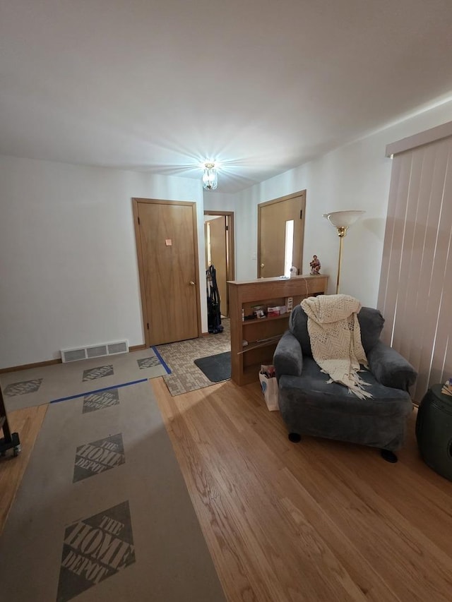 6124 W Berteau Ave, Chicago, IL 60634 - living room featuring light wood-style flooring
