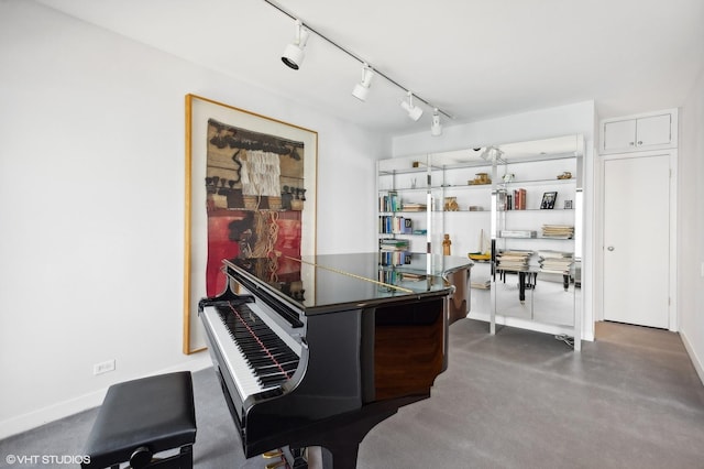 1100 N Lake Shore Dr Unit 33A, Chicago, IL 60611 - living area with track lighting, finished concrete floors, and baseboards