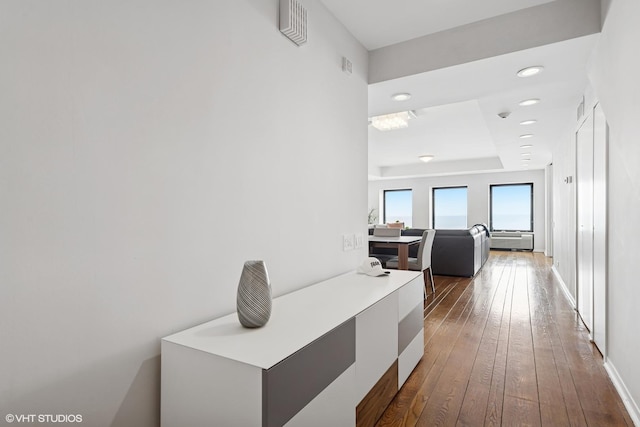 1100 N Lake Shore Dr Unit 33A, Chicago, IL 60611 - hall with an office area, dark wood-style flooring, a raised ceiling, and recessed lighting