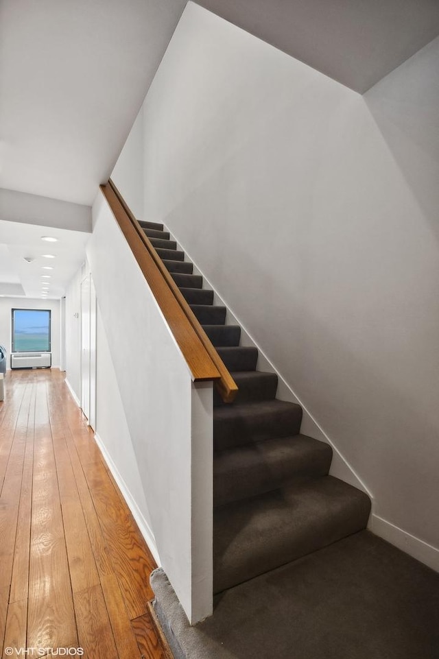 1100 N Lake Shore Dr Unit 33A, Chicago, IL 60611 - staircase with baseboards and wood finished floors