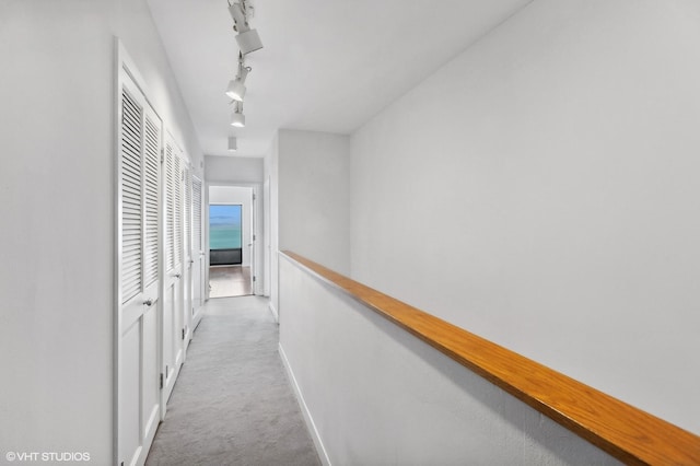 1100 N Lake Shore Dr Unit 33A, Chicago, IL 60611 - hall with carpet, baseboards, and track lighting