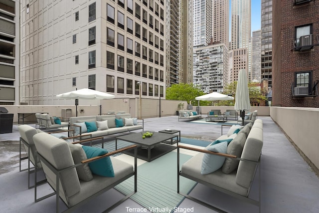 1100 N Lake Shore Dr Unit 33A, Chicago, IL 60611 - view of patio with outdoor lounge area and a view of city