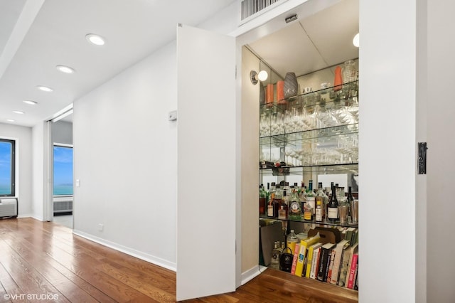 1100 N Lake Shore Dr Unit 33A, Chicago, IL 60611 - indoor dry bar with hardwood / wood-style flooring, recessed lighting, and baseboards