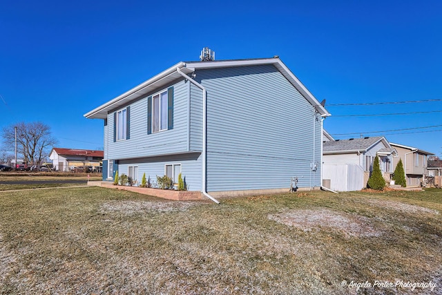1802 11, Waukegan, IL 60085 - view of property exterior featuring a yard