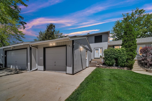 191 Acorn Ln, Bloomingdale, IL 60108 - view of front of property with a front yard and a detached garage