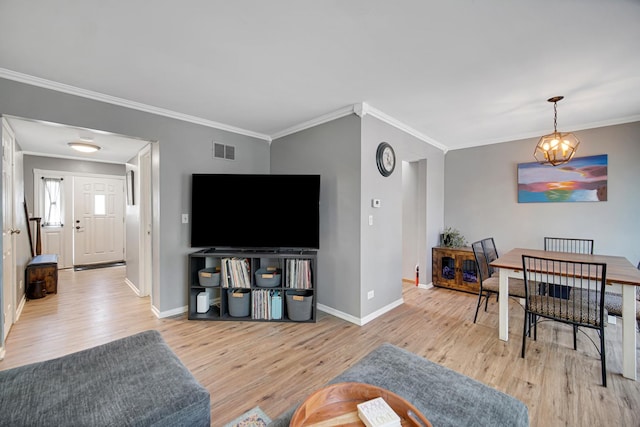 191 Acorn Ln, Bloomingdale, IL 60108 - living area featuring crown molding, wood finished floors, a chandelier, and baseboards