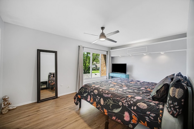 191 Acorn Ln, Bloomingdale, IL 60108 - bedroom with wood finished floors, a ceiling fan, and baseboards
