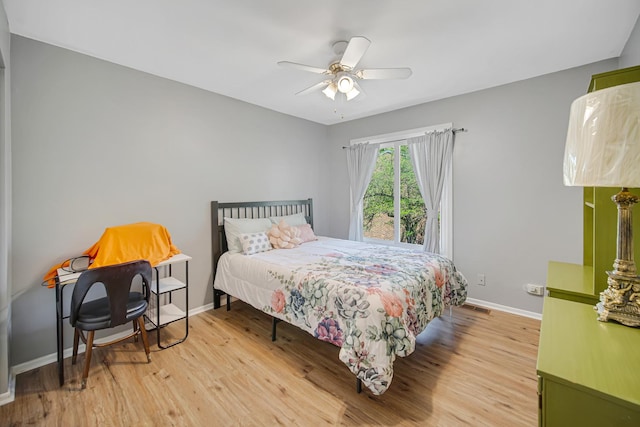 191 Acorn Ln, Bloomingdale, IL 60108 - bedroom with wood finished floors, baseboards, and a ceiling fan