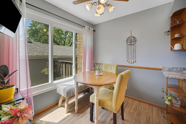 191 Acorn Ln, Bloomingdale, IL 60108 - dining area with a ceiling fan, light wood-type flooring, and baseboards