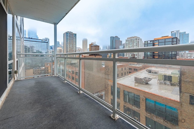 757 N Orleans St Unit 1104, Chicago, IL 60654 - balcony featuring a skyline view