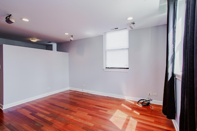 3441 W Grace St Unit G, Chicago, IL 60618 - spare room with wood finished floors, baseboards, and recessed lighting