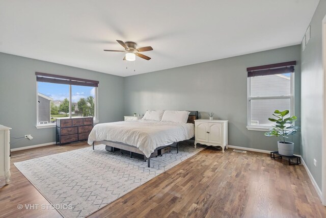 25338 Scott Dr, Plainfield, IL 60544 - bedroom featuring wood finished floors, baseboards, and ceiling fan