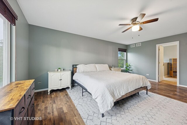 25338 Scott Dr, Plainfield, IL 60544 - bedroom with dark wood-type flooring, baseboards, and a ceiling fan