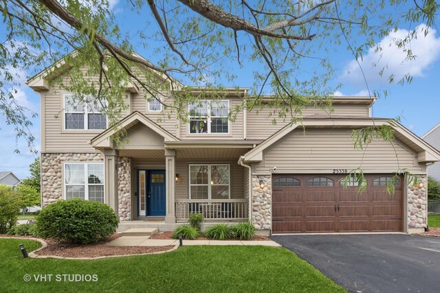 25338 Scott Dr, Plainfield, IL 60544 - entryway with arched walkways, light tile patterned floors, french doors, and baseboards
