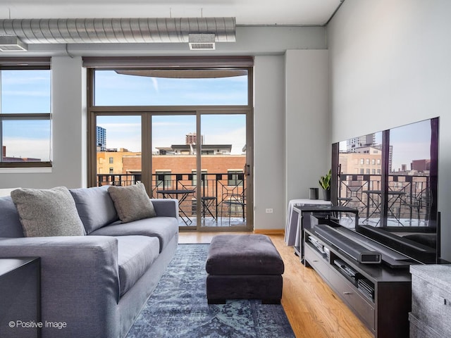 1301 W Madison St Unit 402, Chicago, IL 60607 - living area with light wood finished floors