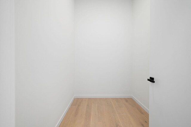 2354 W Farragut Ave Unit Ph-404, Chicago, IL 60625 - unfurnished room featuring light wood-style floors and baseboards