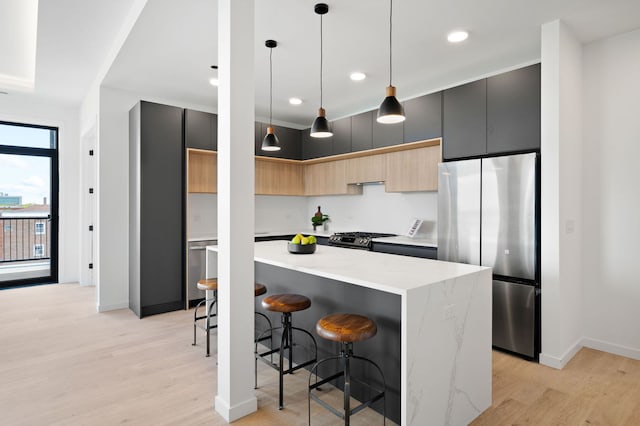 2354 W Farragut Ave Unit Ph-404, Chicago, IL 60625 - kitchen with stainless steel appliances, a center island, modern cabinets, light wood-type flooring, and recessed lighting