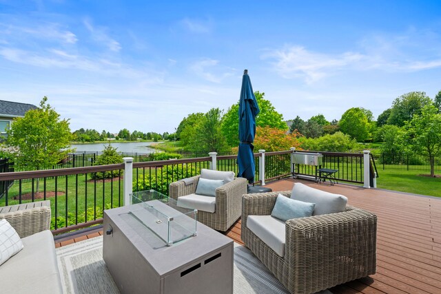 2615 Camden St, Geneva, IL 60134 - deck featuring a water view and an outdoor living space with a fire pit
