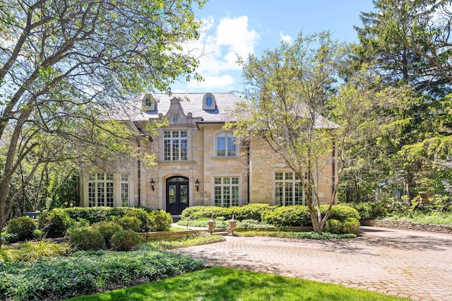 494 Greenleaf Ave, Glencoe, IL 60022 - french provincial home with french doors and stone siding