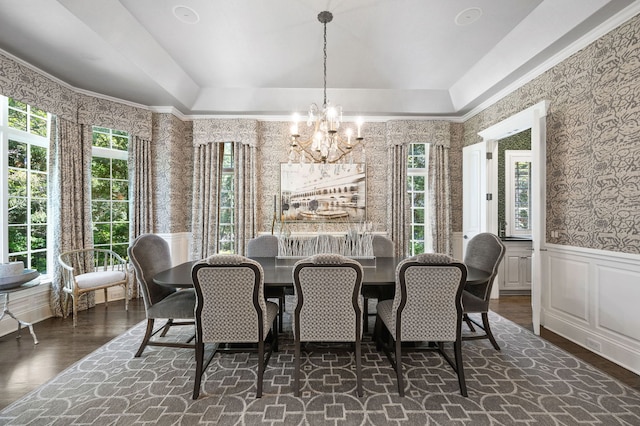 494 Greenleaf Ave, Glencoe, IL 60022 - dining space with a chandelier, wainscoting, wallpapered walls, dark wood finished floors, and a tray ceiling