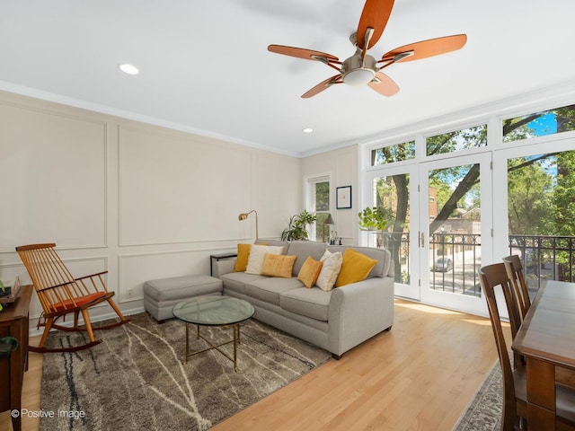 840 N Wood St Unit 2, Chicago, IL 60622 - living room featuring a decorative wall, ceiling fan, ornamental molding, wood finished floors, and recessed lighting