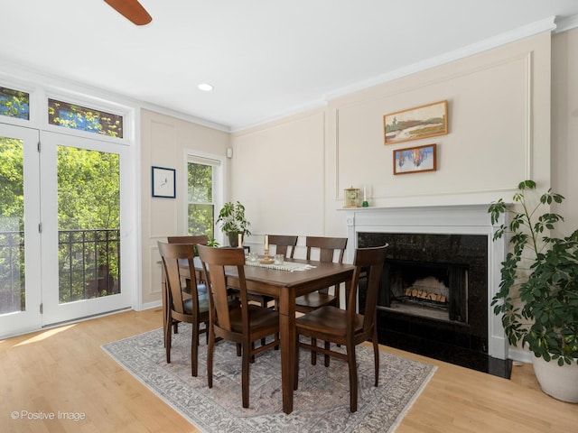 840 N Wood St Unit 2, Chicago, IL 60622 - dining area featuring wood finished floors, crown molding, a high end fireplace, ceiling fan, and recessed lighting