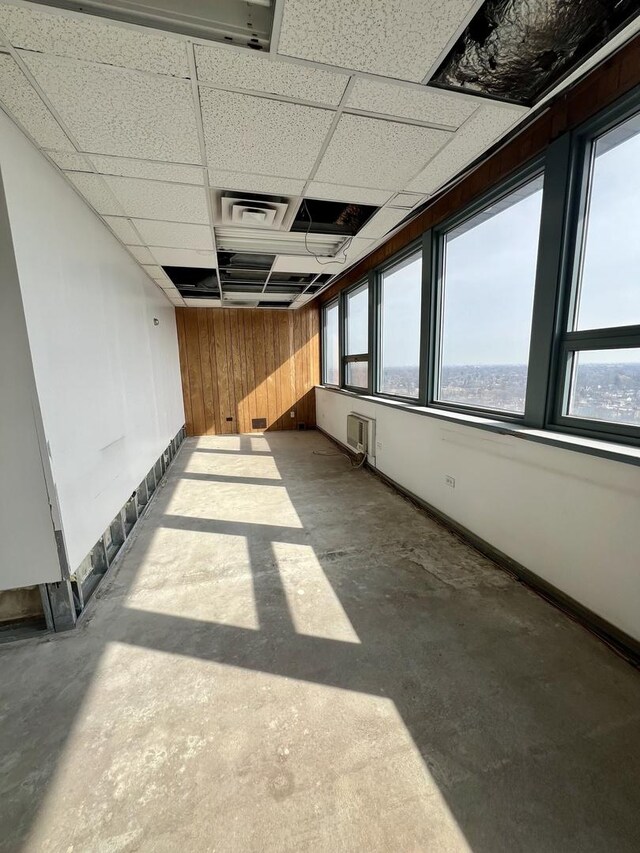 7234 W N Ave Unit 1902, Elmwood Park, IL 60707 - unfurnished sunroom with plenty of natural light and an AC wall unit