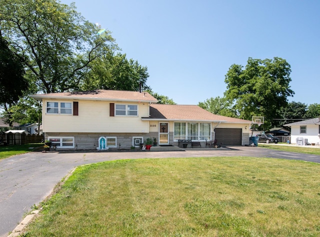 2105 Caton Farm Rd, Crest Hill, IL 60403 - tri-level home featuring driveway and a garage