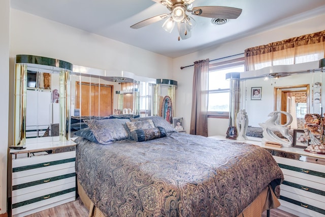 2105 Caton Farm Rd, Crest Hill, IL 60403 - bedroom with wood finished floors and ceiling fan