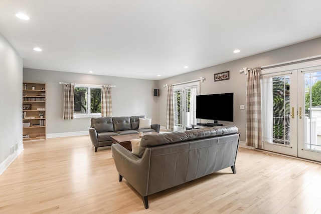 230 N Wisner St, Park Ridge, IL 60068 - living room featuring french doors, light wood-style floors, baseboards, and recessed lighting