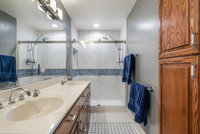 230 N Wisner St, Park Ridge, IL 60068 - bathroom with a shower stall, double vanity, tile patterned floors, and recessed lighting