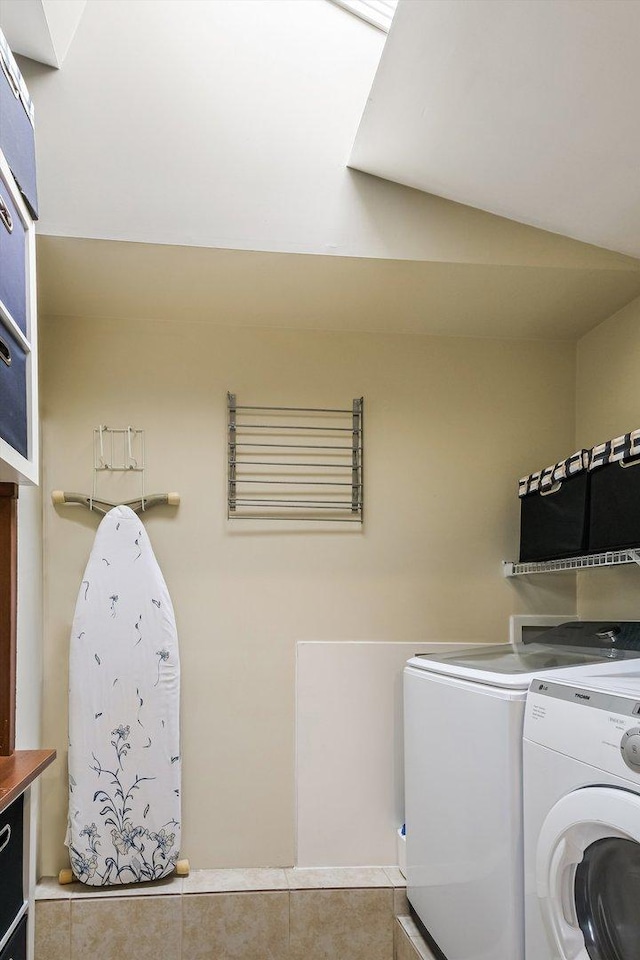 230 N Wisner St, Park Ridge, IL 60068 - laundry room featuring washer and dryer and tile patterned flooring