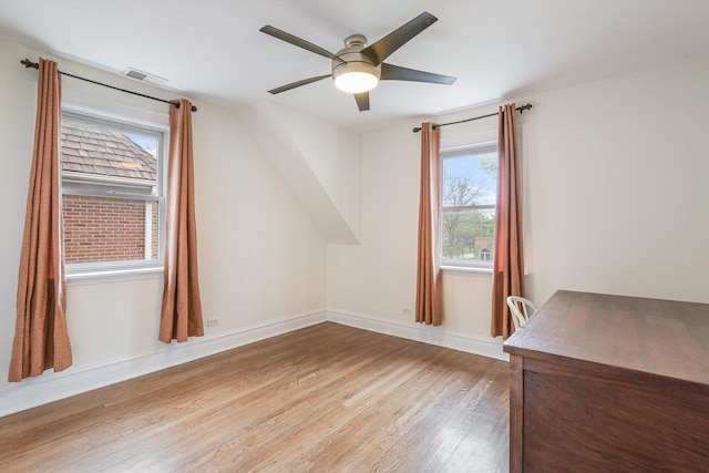 230 N Wisner St, Park Ridge, IL 60068 - unfurnished office with light wood-style flooring, ceiling fan, plenty of natural light, and baseboards