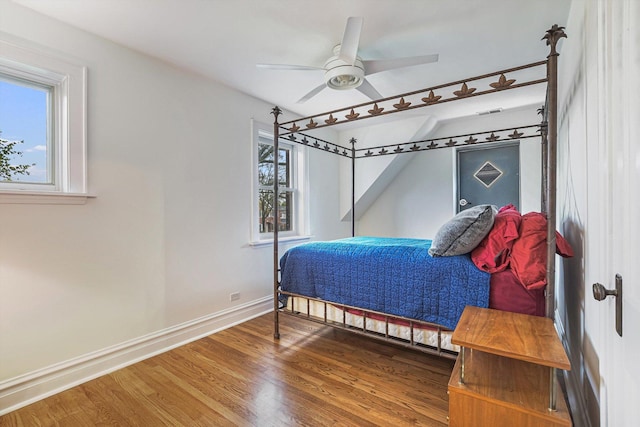 230 N Wisner St, Park Ridge, IL 60068 - bedroom featuring multiple windows, wood finished floors, and baseboards