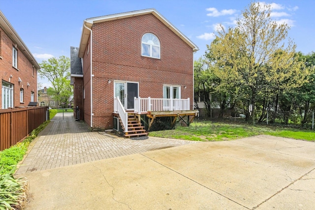 230 N Wisner St, Park Ridge, IL 60068 - back of house with a deck and brick siding